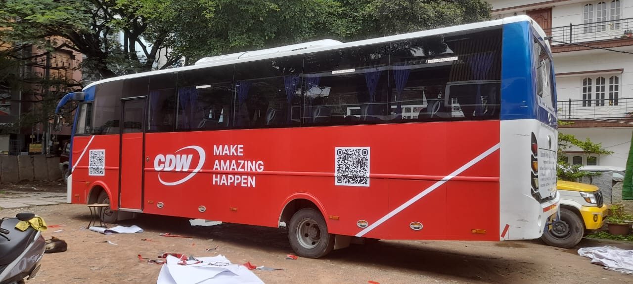 CDW branded coach, full side vehicle wrap